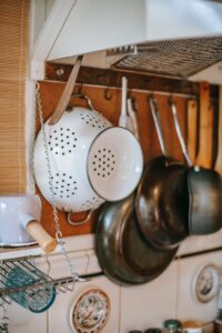 Image of pots and pans hanging from the ceiling