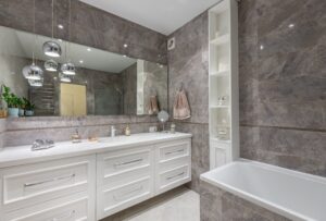 Image of beautiful bathroom with shelves to maximize space and storage